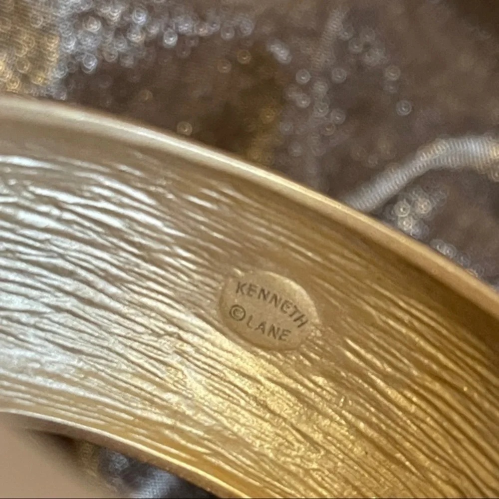 Kenneth Jay Lane satin gold bangle hinged domed